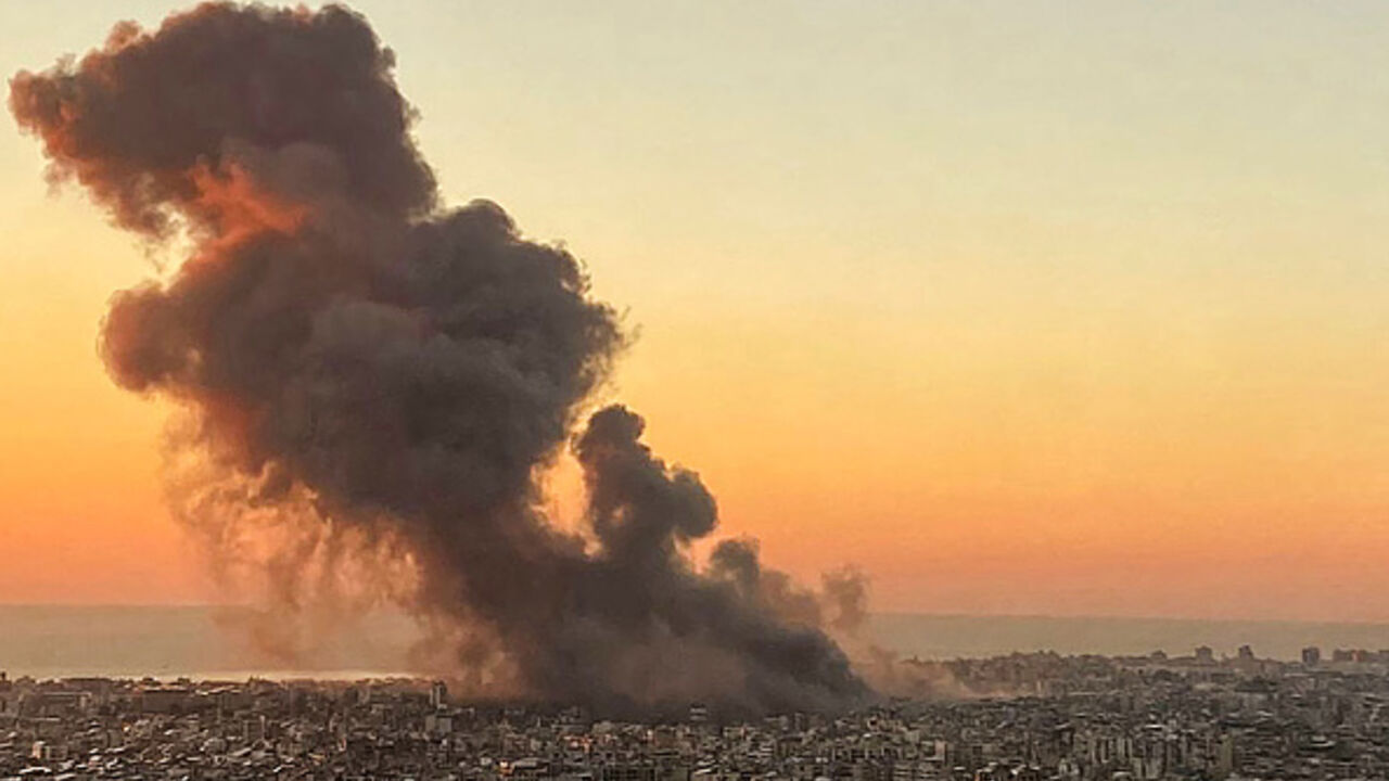 Smoke rises above Beirut's southern suburbs during an Israeli strike on September 27, 2024. Israeli bombing of Iran-backed Hezbollah strongholds around Lebanon has killed hundreds of people this week, while the militant group has retaliated with rocket barrages. (Photo by AFP) (Photo by -/AFP via Getty Images)